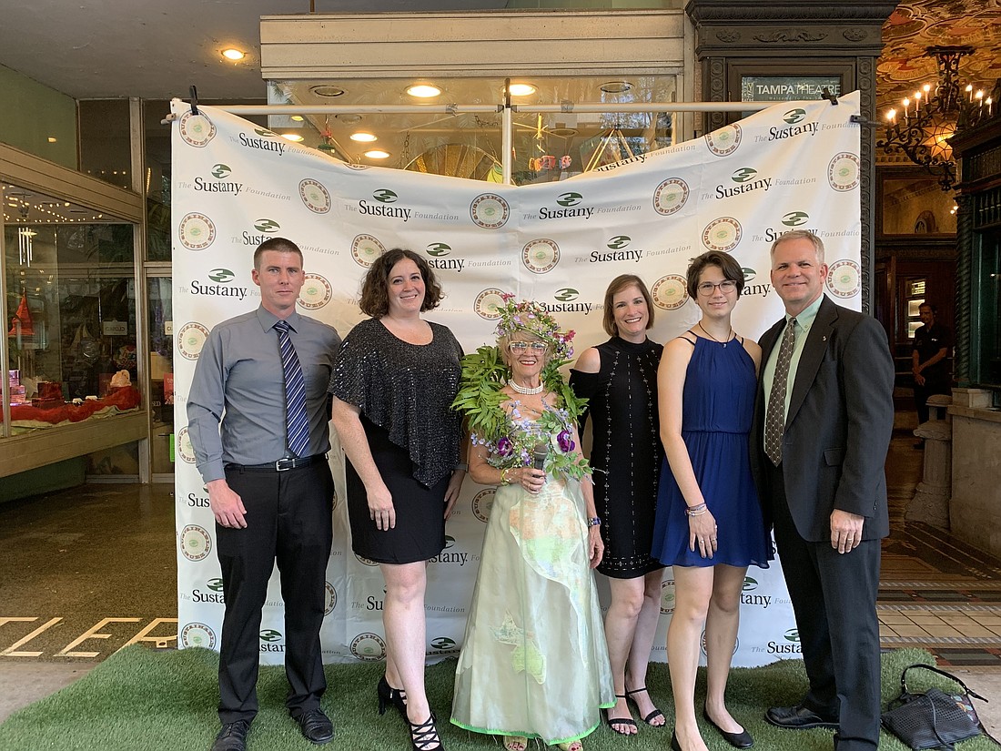 Courtesy. David Mosley, Michelle Mullin, Mother Nature, Cynthia Holliday, Faith Holliday and Tim Holliday attended a recent Sustany Foundation ceremony where Children&#39;s World took home an award.
