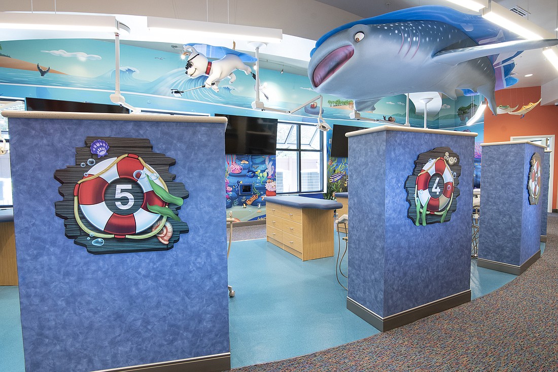 Courtesy. The open bay area of the new Naples Pediatric Dentistry of Florida location features suspended sea creatures to keep young minds distracted and entertained.