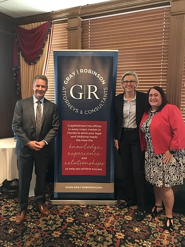 Tampa Mayor Jane Castor is flanked by GrayRobinson attorneys Fred Schrils and Julia Mandell at the firm&#39;s Sept. 26 Community Leadership Forum. Courtesy photo.