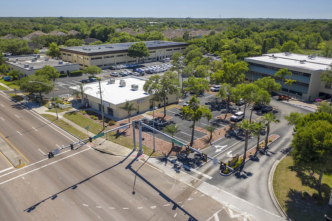 COURTESY PHOTO â€” Woodside Capital Partners acquired the eight-building Counsel Square office complex in Pasco County through the online auction site Ten-X.