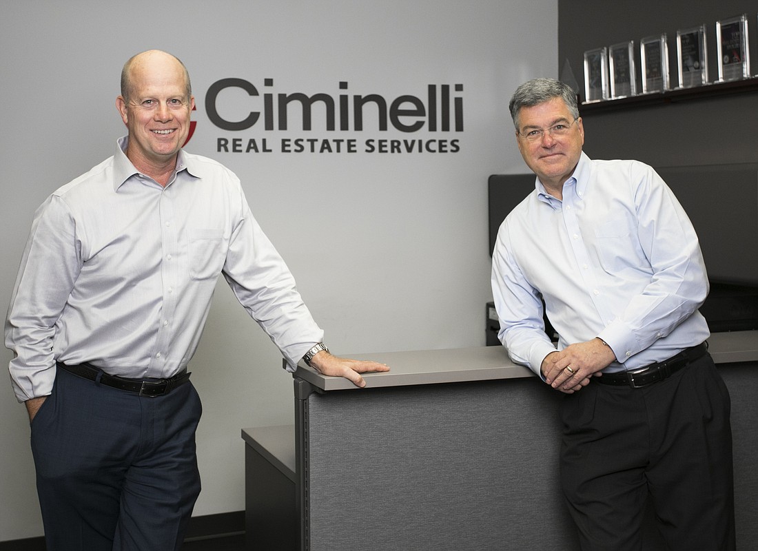 Mark Wemple. Hunter Swearingen, left, and  Tom McGeachy are in buy mode for Ciminelli Real Estate Services in Florida.