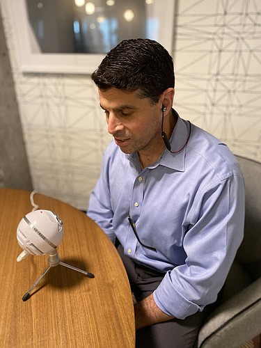 David Sobelman, founder and CEO of 3 Properties, records an episode of "Net Lease Nerdcast" at his office in Tampa. Courtesy photo.