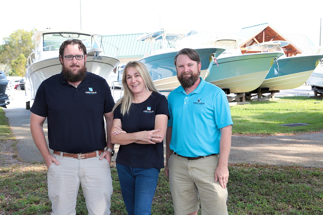 File. From left, Justin, Diane and Travis Fricke have helped guide Fort Myers-based  Fish Tale Boats since 2010.