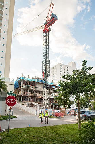 Courtesy. Real estate agents attended a recent hard hat tour of the Epoch condominium tower under construction in downtown Sarasota.