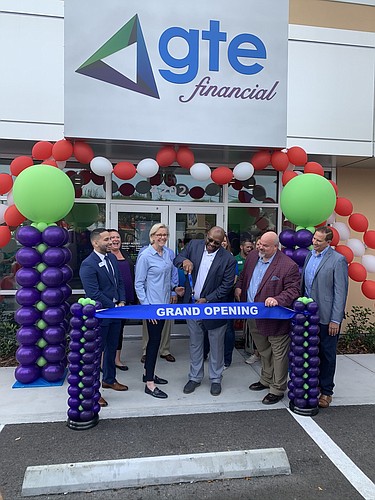 Tampa Mayor Jane Castor, second from left, helps cut the ribbon on GTE Financial&#39;s new South Tampa branch. Courtesy photo.