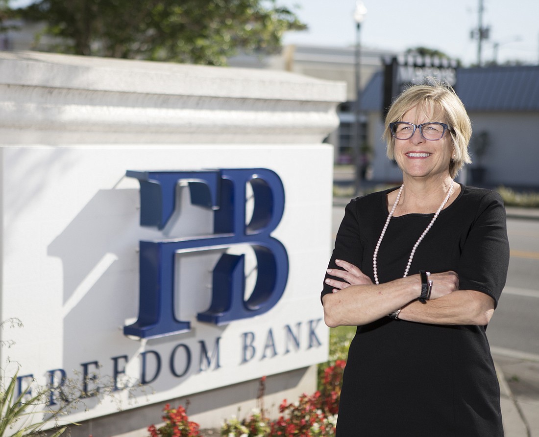 File. Cathy Swanson presided over Freedom Bank as CEO. She will remain with Seacoast Bank as Pinellas County market president.