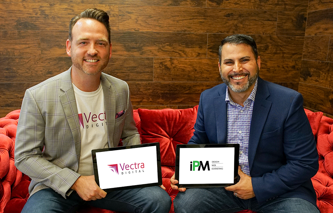 Courtesy. Vectra Digital CEO Matt Bernhardt, left, with iPartnerMedia founder Albert Arguelles.