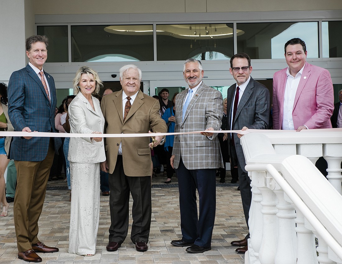 From left: Mainsail Lodging CEO Joe Collier, Karol and Fred Bullard, St. Pete Mayor Rick Kriseman, Visit St. Pete/Clearwater CEO Steve Hayes and Karol Hotel General Manager Adam Duffey. Courtesy photo.