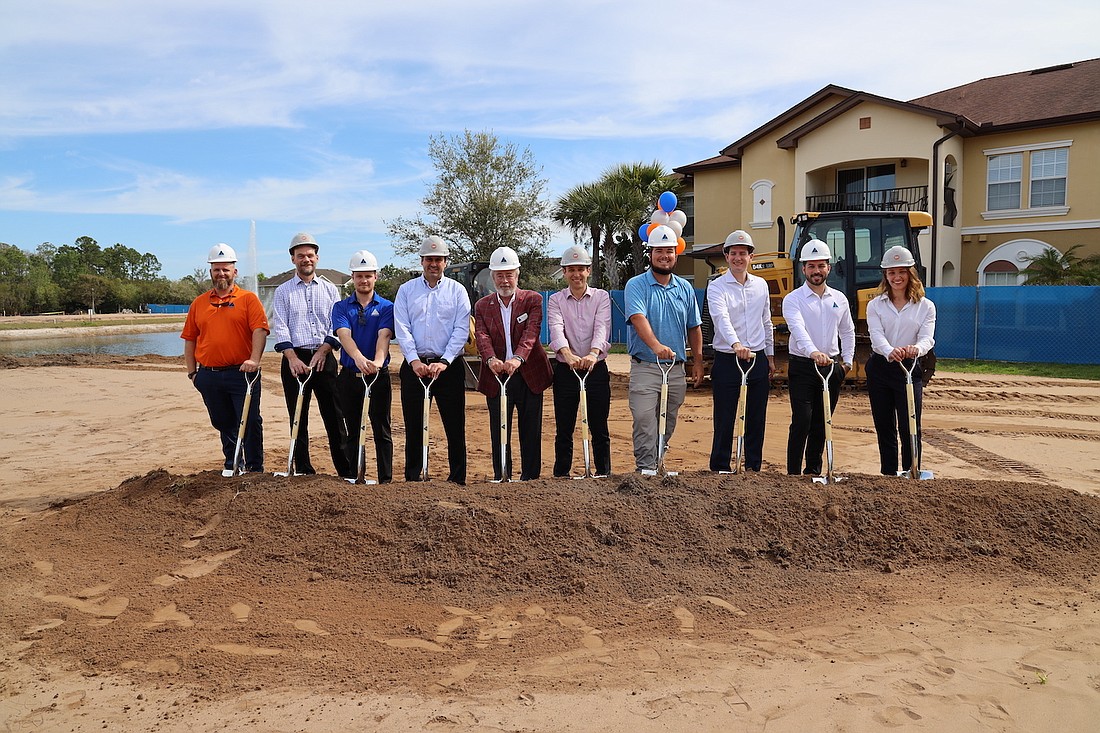 Stoneweg US and Summit Contracting Group executives break ground on the Tuscan Reserve Apartments project on March 12 in Palm Coast. Courtesy photo.