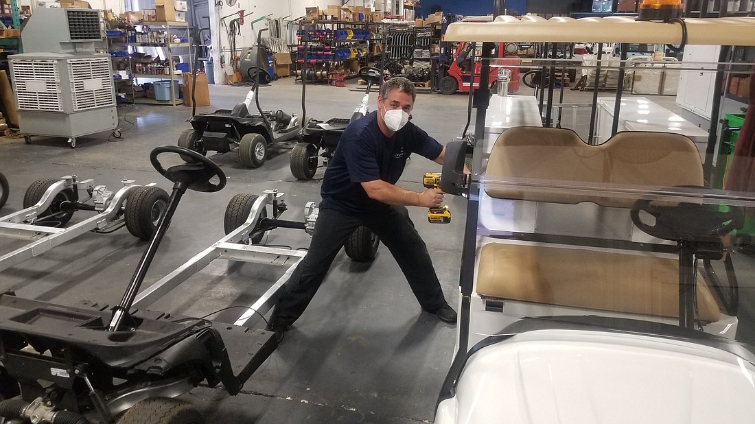 Courtesy. Cruise Car Production Foreman Frank Mello and other employees have been working on more medical carts for customers lately.