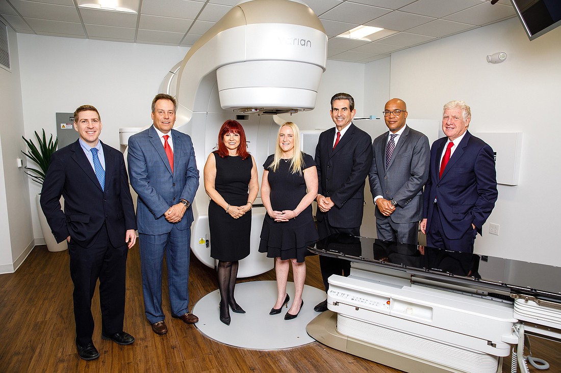 Eight doctors helped launch  Advocate Radiation Oncology. From left, Drs. Arie Dosoretz, David Rice, Graciela Garton, Amy Fox, James Rubenstein, Alan Brown and Daniel Dosoretz. Not pictured Dr. Michael Katin.