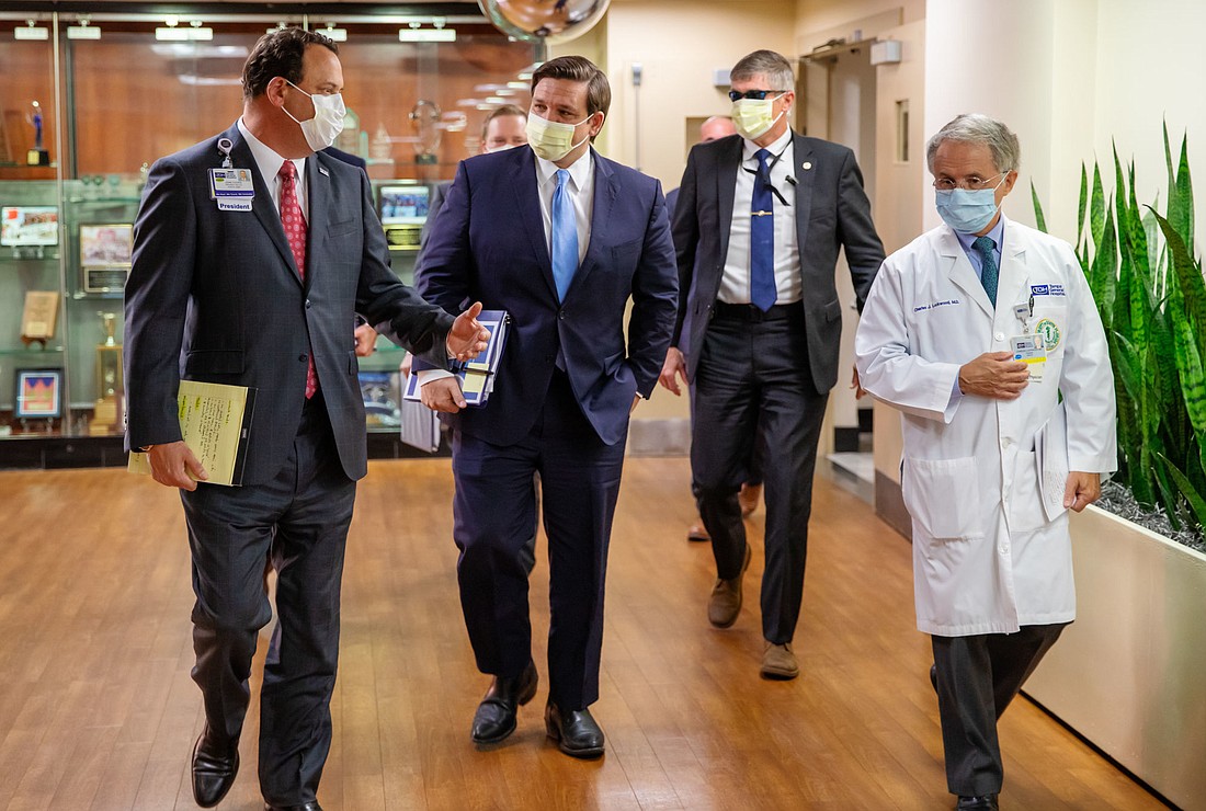 Courtesy. Gov. Ron DeSantis, middle, recently toured Tampa General Hospital with CEO John Couris.