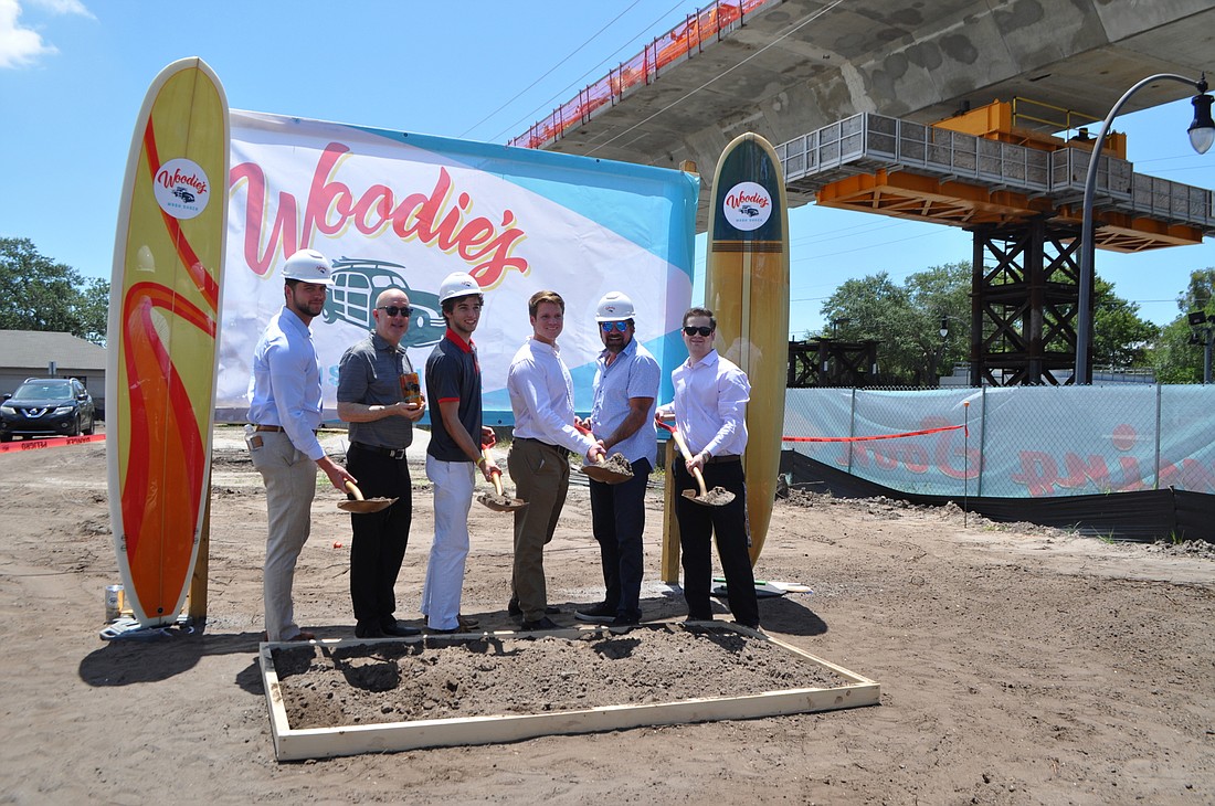 Courtesy. The Woodie&#39;s Wash Shack team, led by Don Phillips, second from right, broke ground on the company&#39;s second location, in south Tampa, on June 24.