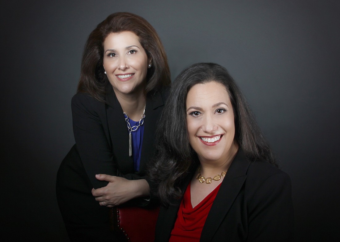 Courtesy. Lauren Weiner, right, and Donna Huneycutt co-founded WWC, a federal contracting and consulting business, in 2004.