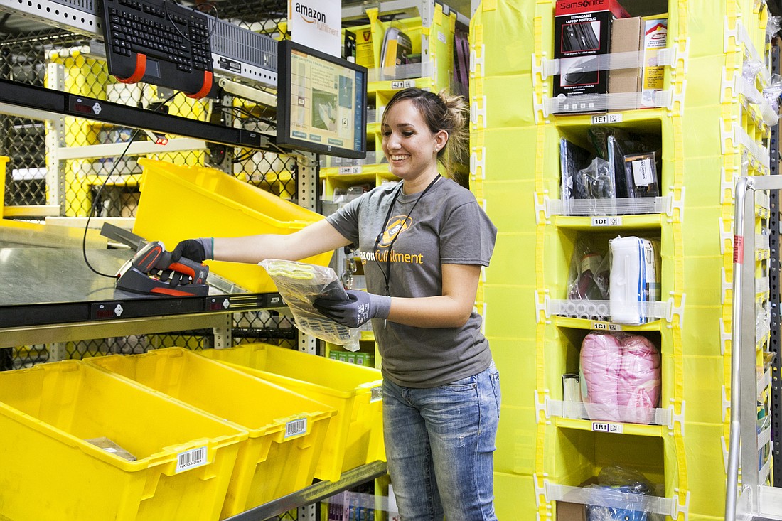 Courtesy. Amazonâ€™s new fulfillment center, under construction in Auburndale, will create 500 full-time jobs that start at $15 per hour with benefits.Â