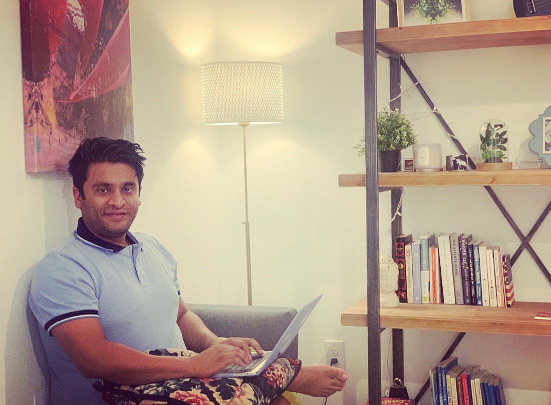 Courtesy. Arjun Choudhary, vice president of Onicx Group, works in his home office.