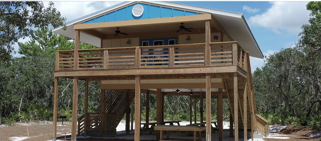 Courtesy. The cabins had to meet several safety, fire and hurricane requirements, including installing lighted steel railings next to wood railings, having provisions for wheelchairs and raising the cabins about 15 feet up.