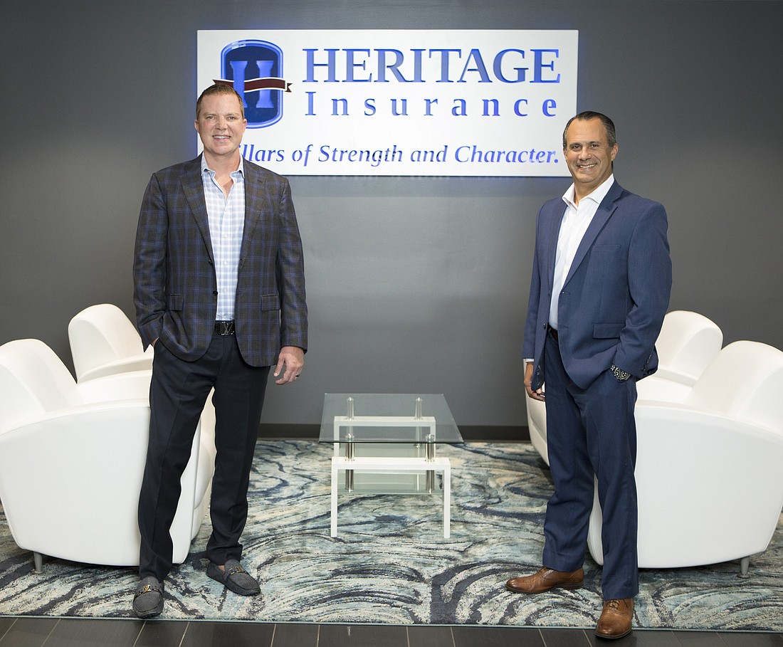 Mark Wemple. Heritage Insurance CEO Bruce Lucas, left, and COO Ernie Garateix.