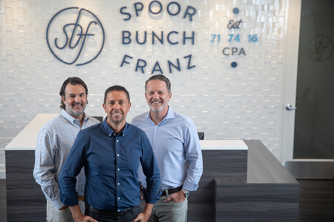 Chris Zuppa. Spoor Bunch Franz partners W.G. Spoor, Rich Franz and Steve Bunch at SBFâ€™s St. Petersburg headquarters.