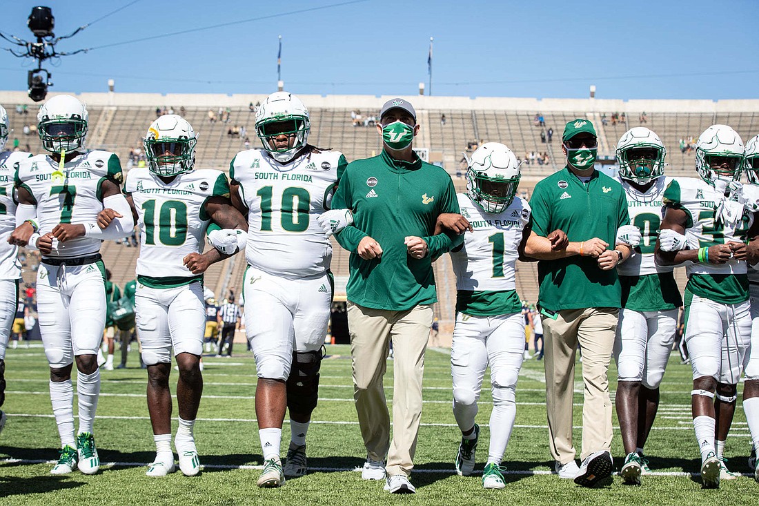 Courtesy. The USF Bulls football team gets ready for a game.