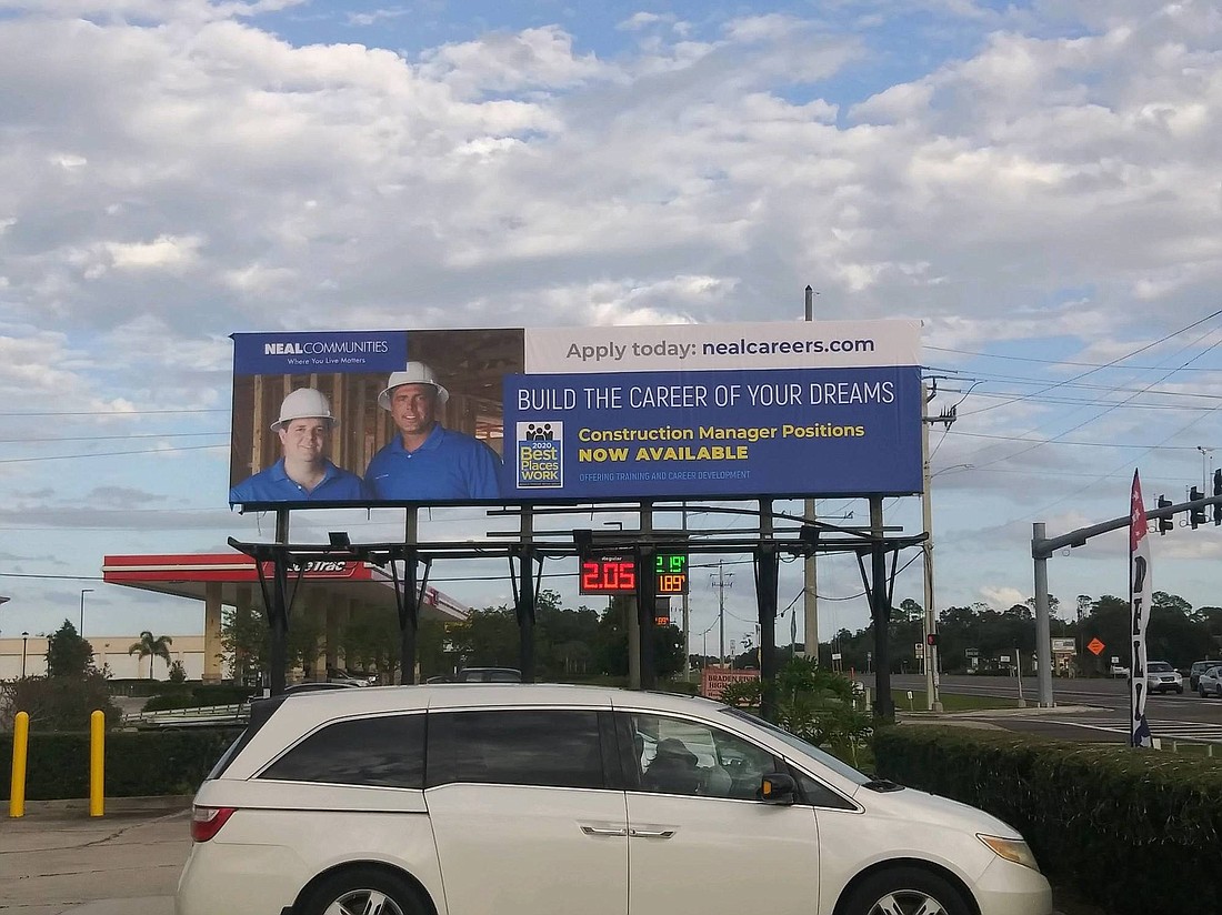 Courtesy. For the first time, Neal Communities, with $412.5 million in gross revenue in 2019, is using billboards to promote its job openings.