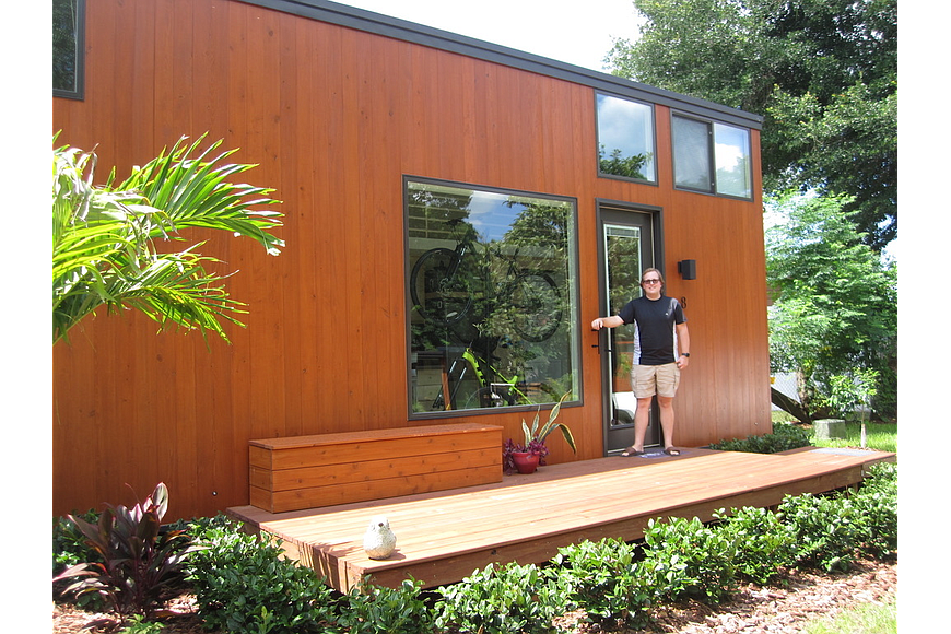 File. Tim Mastic was the first person to buy a tiny home in the Escape Tampa Bay Village.
