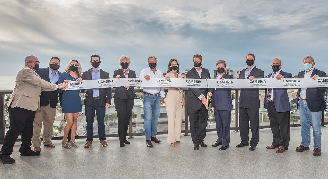 Courtesy. Madeira Beach officials and Choice Hotels International executives on Dec. 4 cut the ribbon on the 125-room Cambria Hotel St. Petersburg-Madeira Beach Marina.
