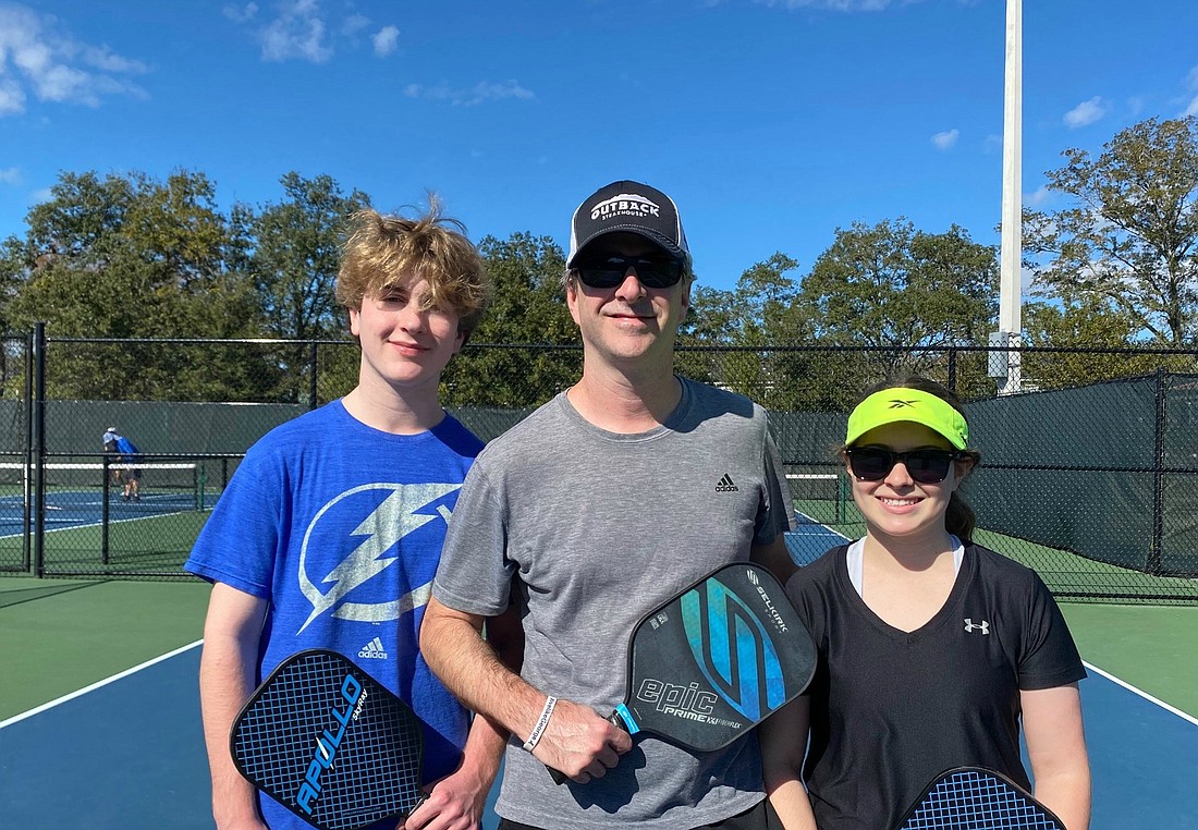 Courtesy, Leslie Healy. In addition to playing with colleagues,Â Michael Healy also regularly plays pickleball with his family, including his children,Â Asher and Kate Healy.
