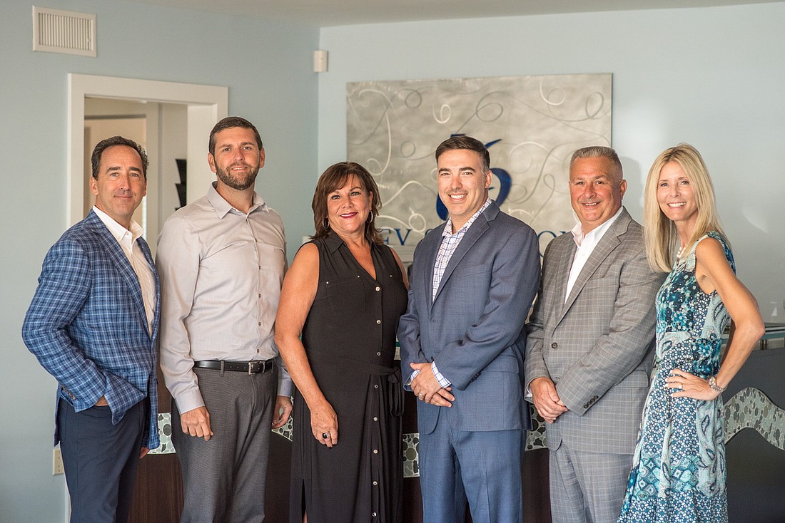 Courtesy. Pictured, from left, are Matt Lane, WRRE Florida GM, Keith Redding, Susan Saltalamacchia, Brian Tresidder, all of Key Solutions, Paul Bocka, WRRE business development VP, and Molly Lane, WRRE Florida GM.