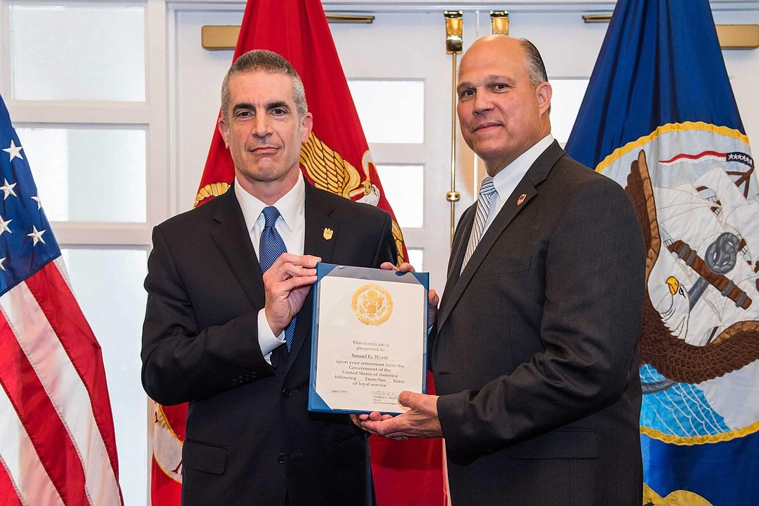 Courtesy. Samuel Worth, right. who retired from the U.S. Naval Criminal Investigative Service in 2018, says a positive work culture facilitated from the top pays big dividends.