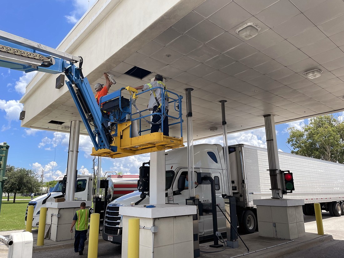 Courtesy. Installation of security cameras at the North Gate access control complex is among efforts proceeding at Port Manatee with a boost from federal grant funding.