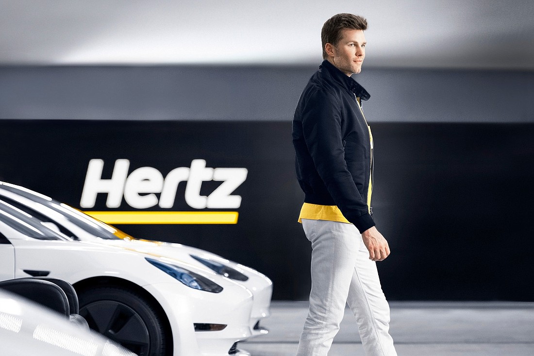 Tampa Bay Buccaneer quarterback Tom Brady was named the new face of Hertz's electronic vehicle program in October 2021.