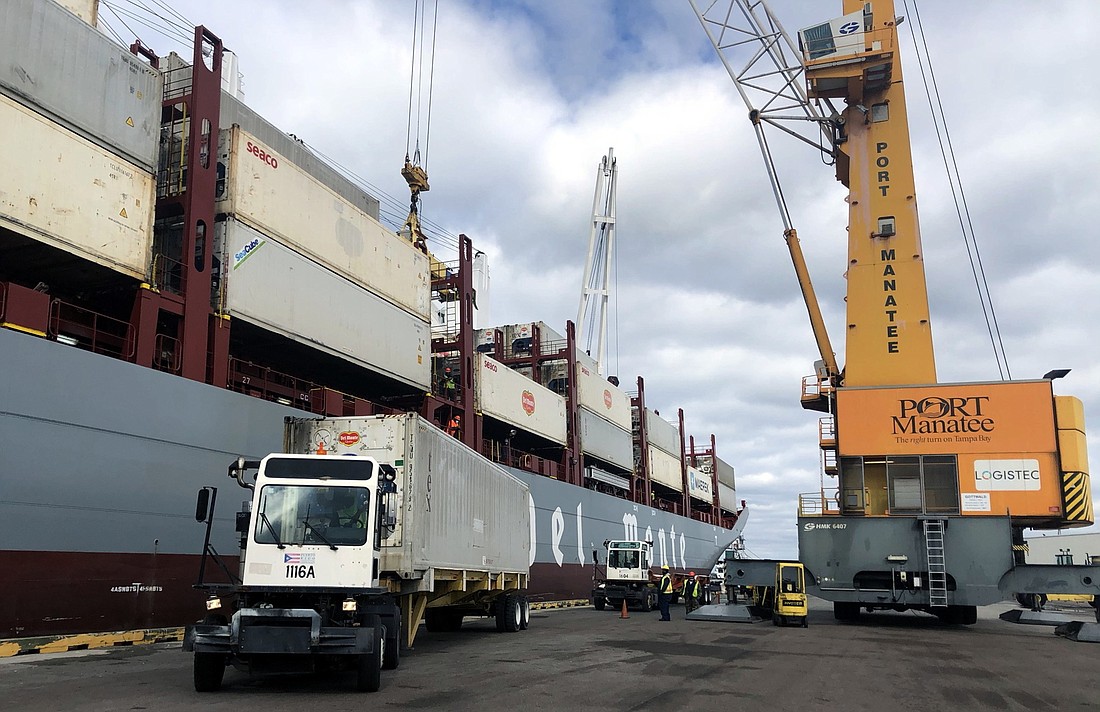 Courtesy. Containers filled with fresh fruits are offloaded at Port Manatee from the Del Monte Spirit, an energy-efficient containership fleet.