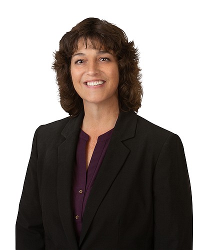 Courtesy. Michelle Ravagni was recently promoted to VP at Englewood Bank & Trust. She&#39;s been there since 2006 as a member of the retail support team.