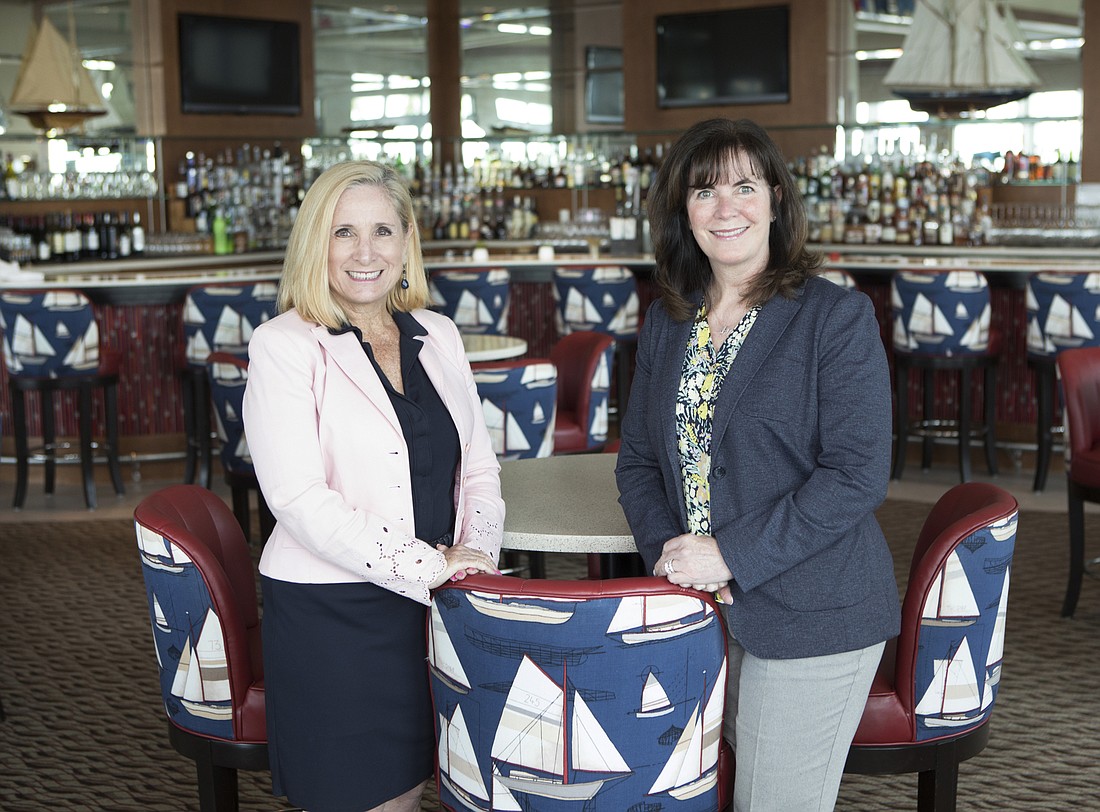 File. Karen Harmon and Stephania Feltz are excited for the challenges that a diverse membership has to offer at the Sarasota Yacht Club.