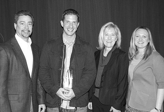 Jason Duggar (second from left) won Affiliate of the Year and he's with Glenn Layton, NEFBA President Barbara Moore and SMC chair Denise Patricolo.