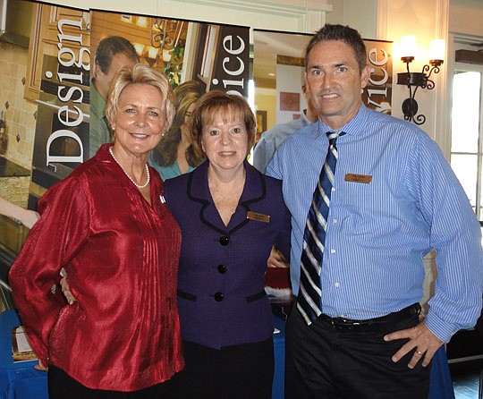 Joyce Andrzejewski, Cindy Siefert and Mike Daniel at the David Weekly Homes booth.