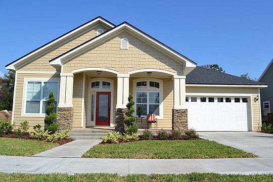 Grand openings are held at model homes, such as this one. It's in RiverTown and Dennis Homes has completed construction on The Edgewater model.