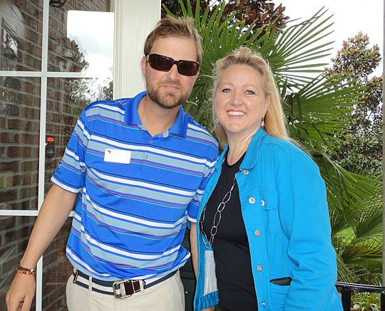 Keith Jones and Kelly Touhey (above) of East West Realty greeted Realtors in the Welcome Center.