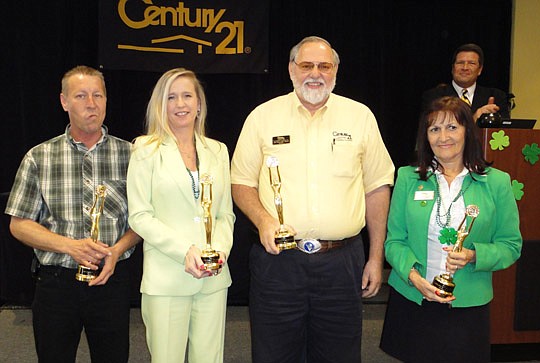 Century 21's Northeast Florida Brokers Council gave awards last month at the Jacksonville Marriott. Four people were recognized with the company's highest honor, Centurion Awards (from left:) Wayne Altman and Kathy DiGiovanni of Century 21 Lighthouse ...
