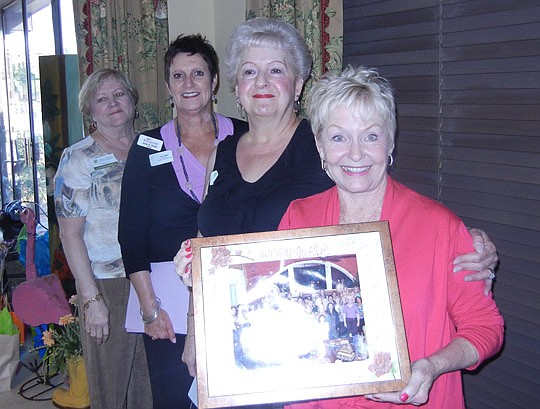 Sharon Pacetti, Judy Hicks, Sue Andrews and Naomi Lumley - presentation of 10th Anniversary gift (signed photo of Womenade group)