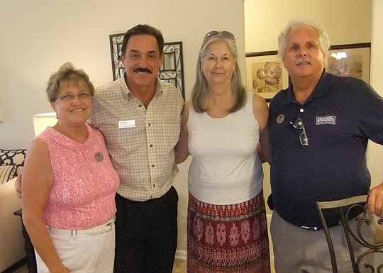 DR Horton opened a model in its Ashley Oaks subdivision last month for area Realtors. Andy Fremento, the North Florida division president (second from left) was on hand to greet guests. Coming from Coldwell Banker Premier Properties were Karen Palmer,...