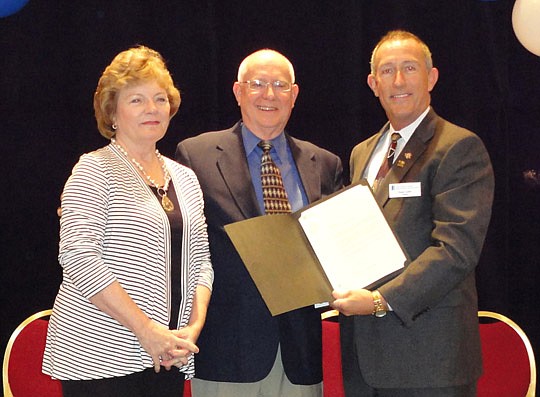 Vetran Realtor Bob Atkins of Century 21 Atkins Realty received emeritus status from the National Association of Realtors and was presented with his certificate during last month's NEFAR meeting at the Marriott Southpoint. NEFAR President Dane Leslie p...