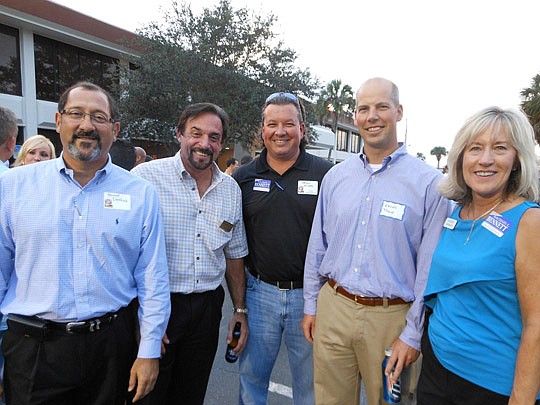Attorney Howard Sheffield, Andy Fremento of D.R. Horton, NEFBA First Vice President Dennis Ginder of Landon Homes, developer Kevin Troup and NEFBA President Barbara Moore of Lennar.