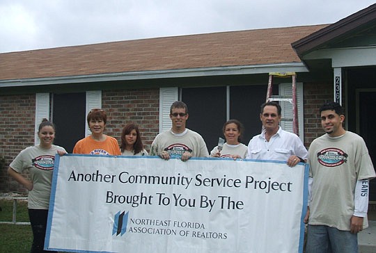 Megan O'Day, Joanna McDermott, Ashley Webb, Michael Zeigerman and Amy Webb of Exit Real Estate Gallery with Don Mullinax of Commission Express and Miguel Ojeda
