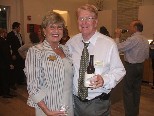 NEFAR's St. Johns Council held a Holiday Mixer at RiverTown last month and Diane and Gerry Bussell of Watson Realty were the winners of a free night at the Alhambra dinner theatre.