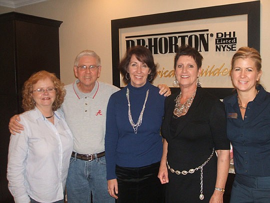 The Sales and Marketing Council held its Fall Festival Mixer at the D.R. Horton community of Castlegate in Aberdeen recently and attending were (from left) Dana Skaff, Southern Lifestyle Homes; Allen Dye, North Star Mortgage; Suzanne Massey, D.R. Hort...