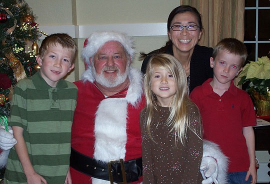 Toll Brothers at Coastal Oaks at Nocatee celebrated the holiday season by hosting special festive events for residents and Brenda Vermillion took children Nicholas, Audrey and Charlie to visit Santa Claus.