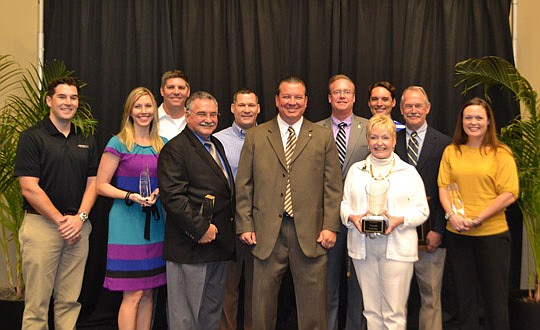 Award winners with the new president: (from left) Brad Shee, Kerry Soltis, Neill Singleton, Larry