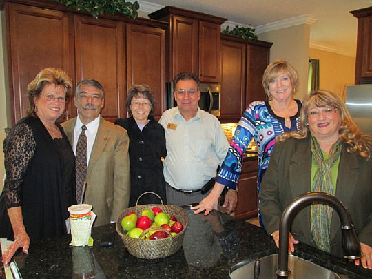 The St. Johns Builders Council held a social event social at Landon Homes' new model in Kings Trace in St. Augustine. The council is part of NEFBA and serves builders and affiliates throughout the county. The staff representative is Leona Brown (left,...